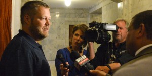 Casey County Clerk Casey Davis speaks with media outlets Monday outside of the Governor's office. Photo by Seth Littrell/slittrell@state-journal.com